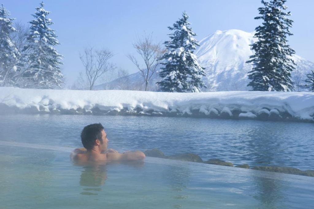 Hilton Niseko Village's open-air onsen bath.