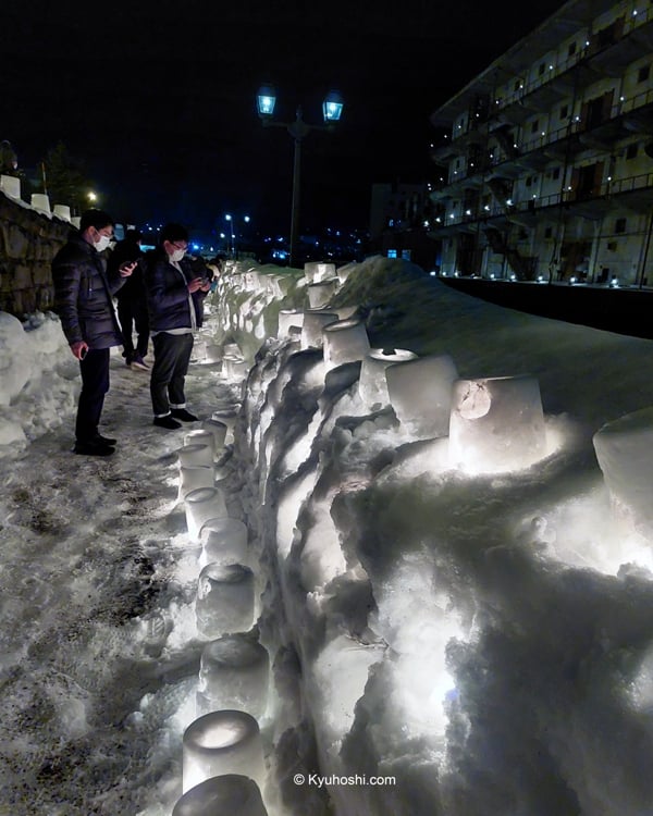 Small snow candles placed along the Otaru Canal